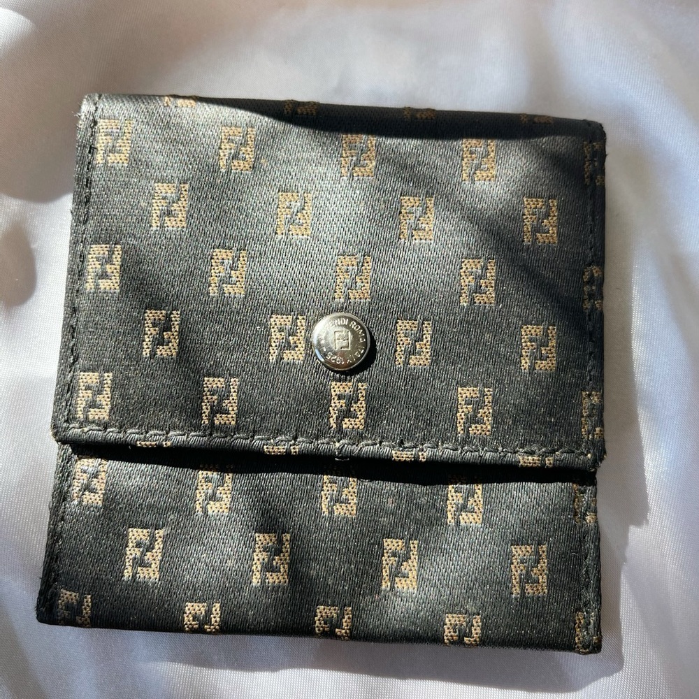 Vintage FENDI nano bag with a gold chain necklace